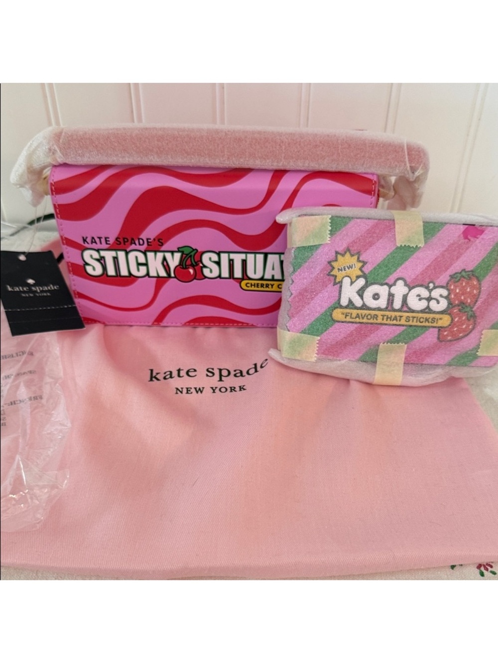 Kate spade sticky situation bag with coin holder. Both NWT. W/dust bag.
